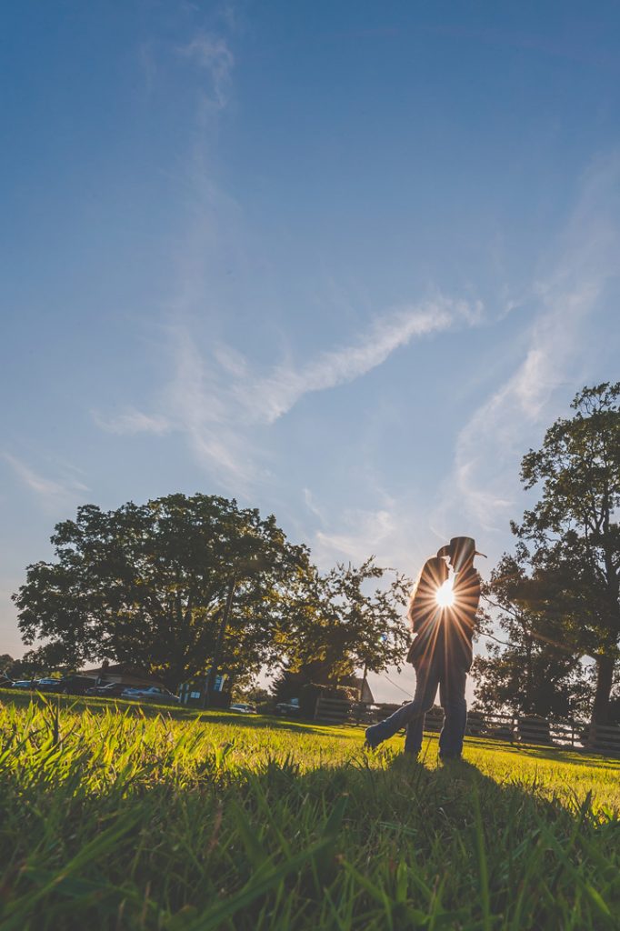Abstract engagement session couple at Windsor Castle Park with sunlight starburst f/22