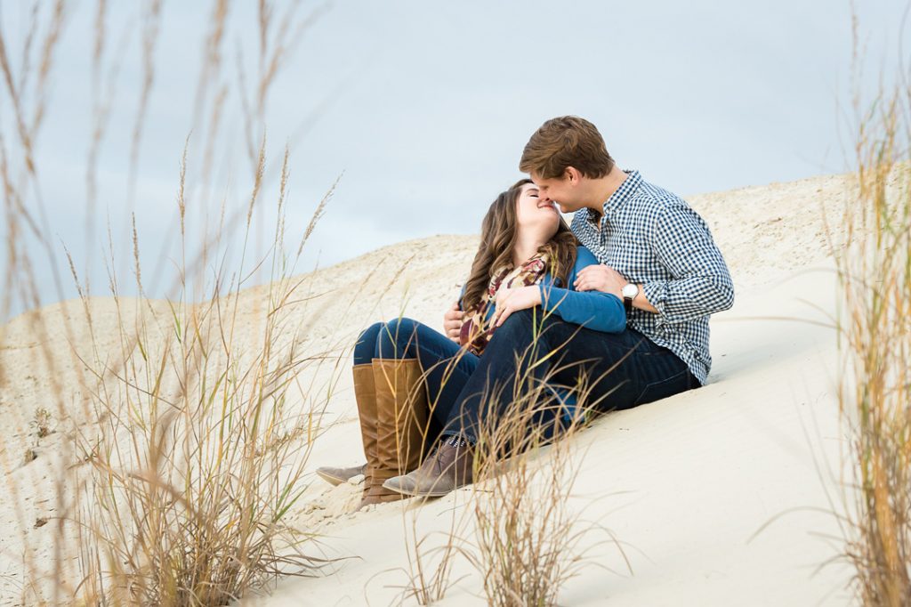 Engagement session couple on the sand