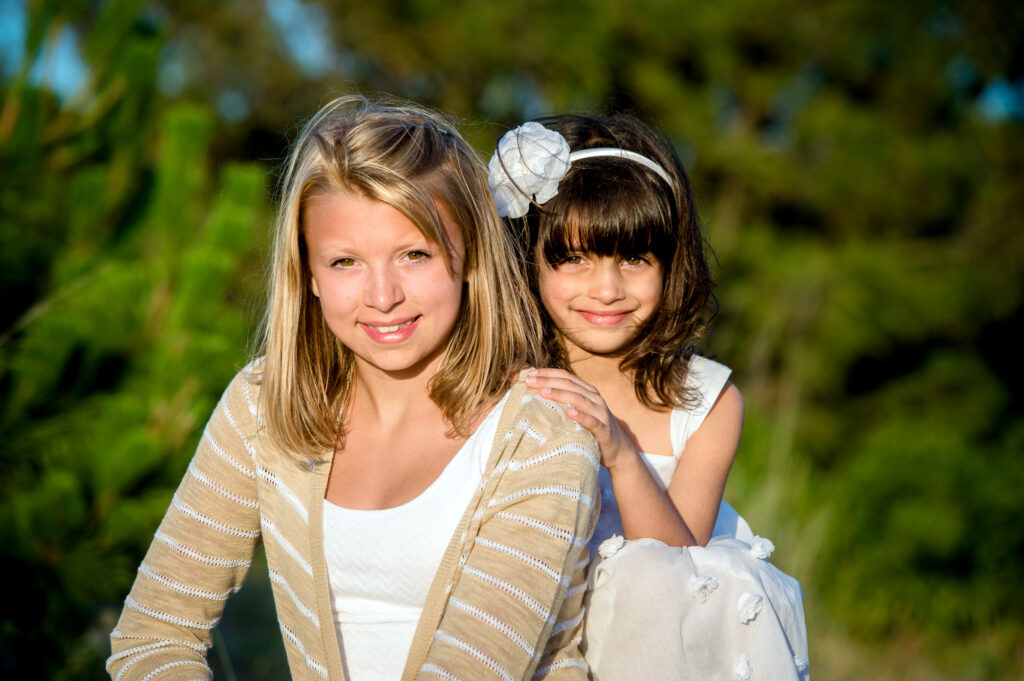 Family portrait of two girl cousins