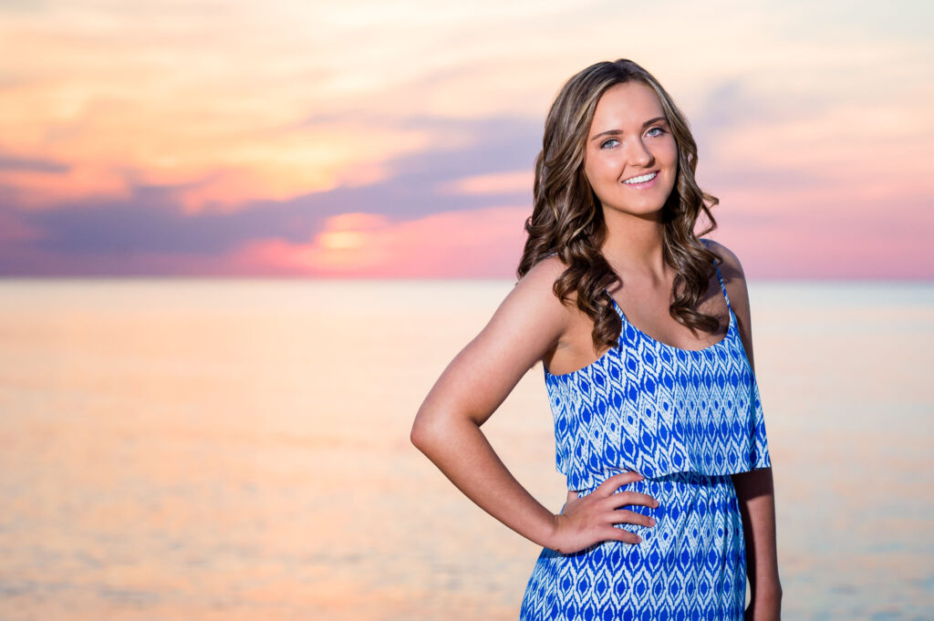 Sunset senior portrait of a young lady at First Landing State Park