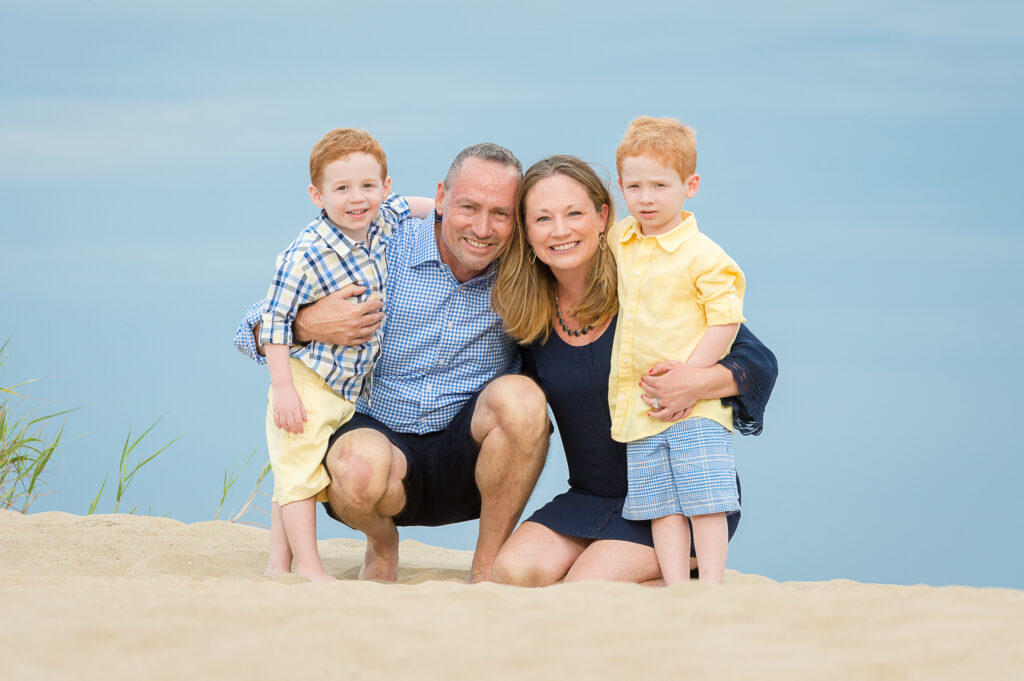 Beach family portraits with bright colors and lots of love