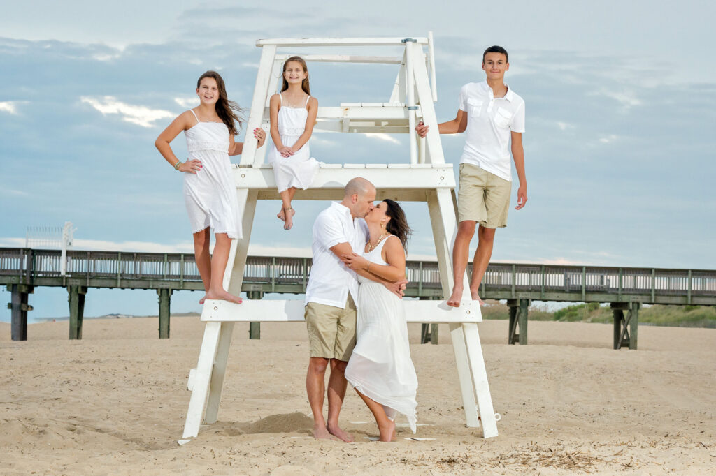 Family portrait on the lifeguard stand at Little Island Park