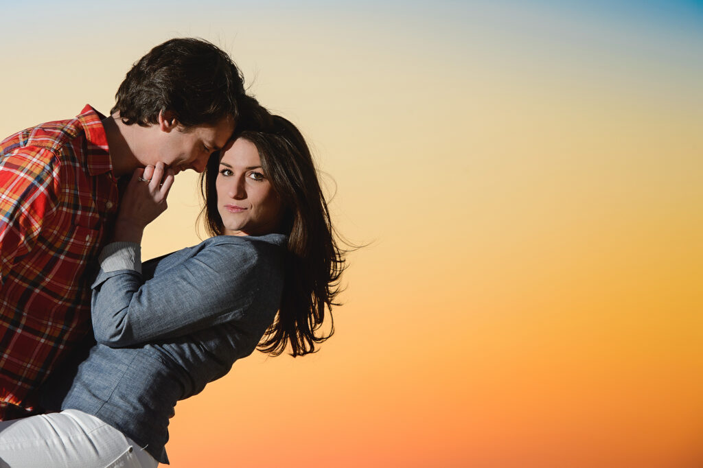Engagement session couple in Virginia Beach at sunset