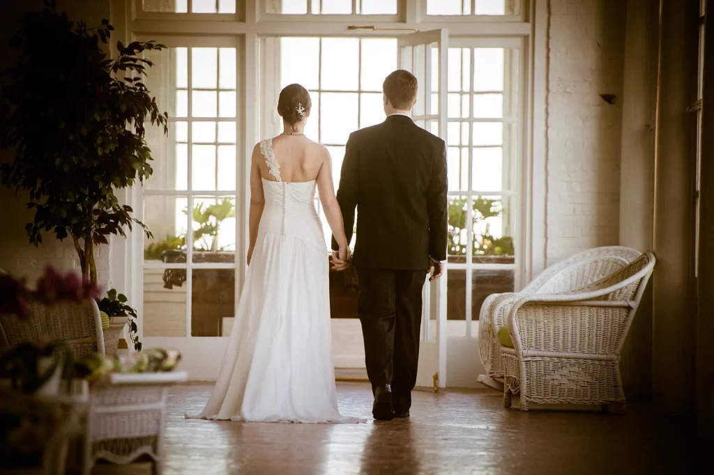 Bride and Groom walking in the Cavalier Hotel