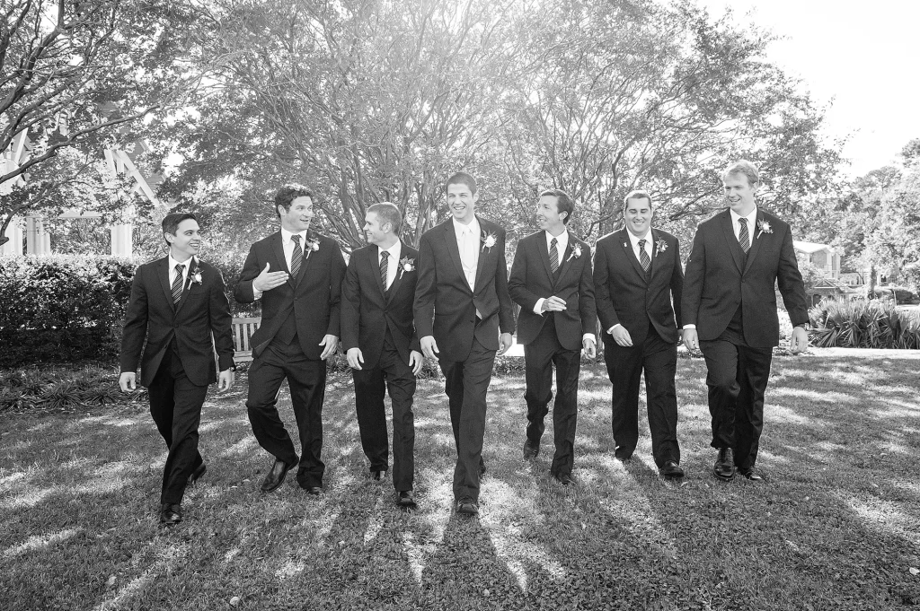 Groom and Groomsmen walking towards the camera