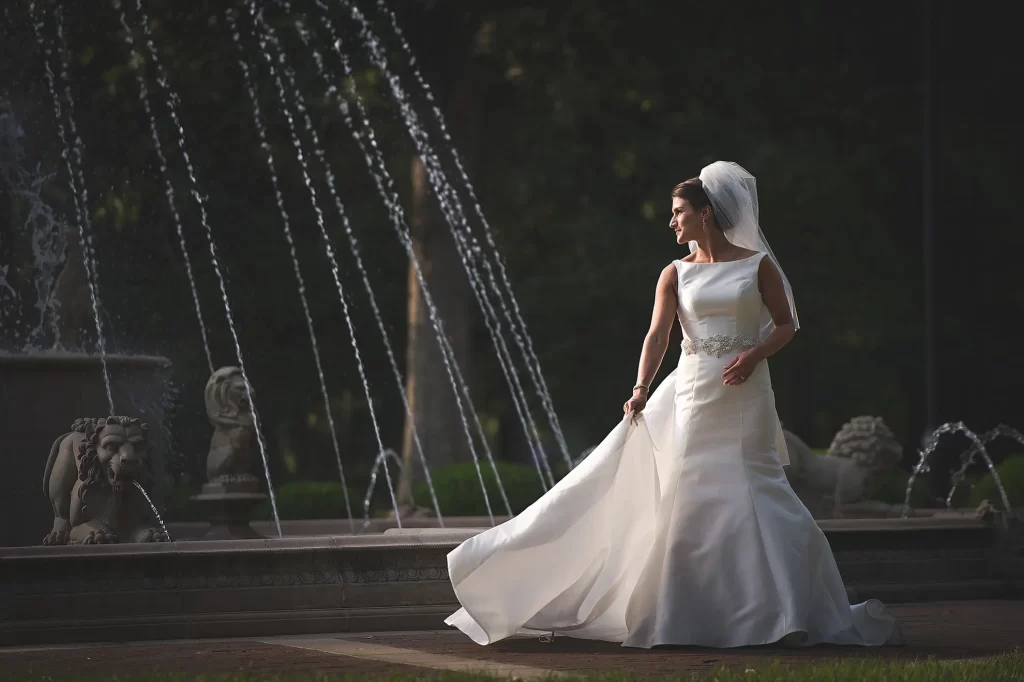 Bride in front of the Regent University fountain