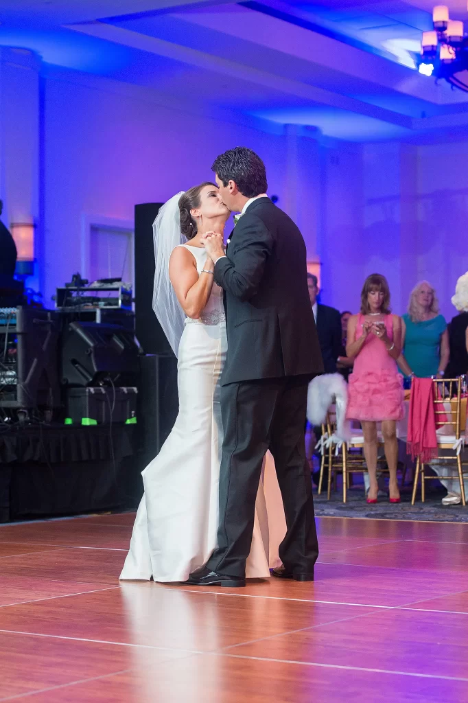 bride and groom first dance kissing