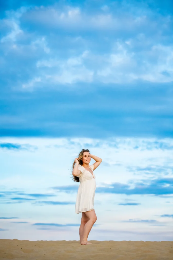 sandbridge beach senior portrait blue sky